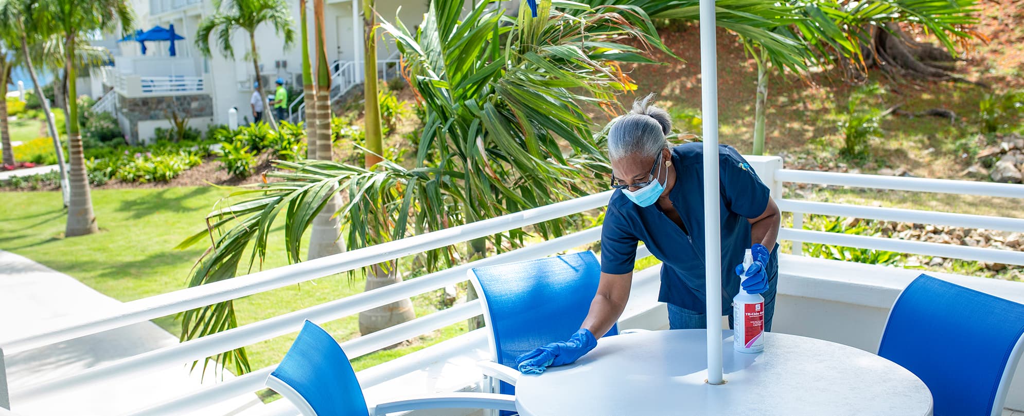 A Wyndham Vacation resort housekeeper following COVID-19 cleaning guidelines 